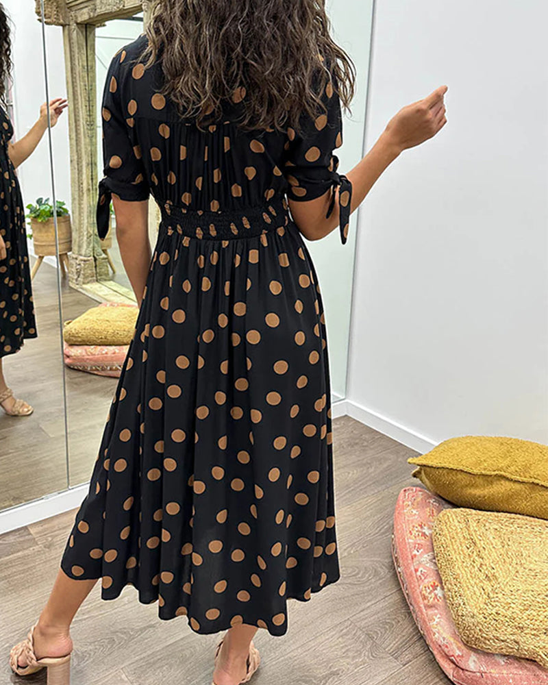 Midi Dress with Polka Dots and a Deep V-Neck