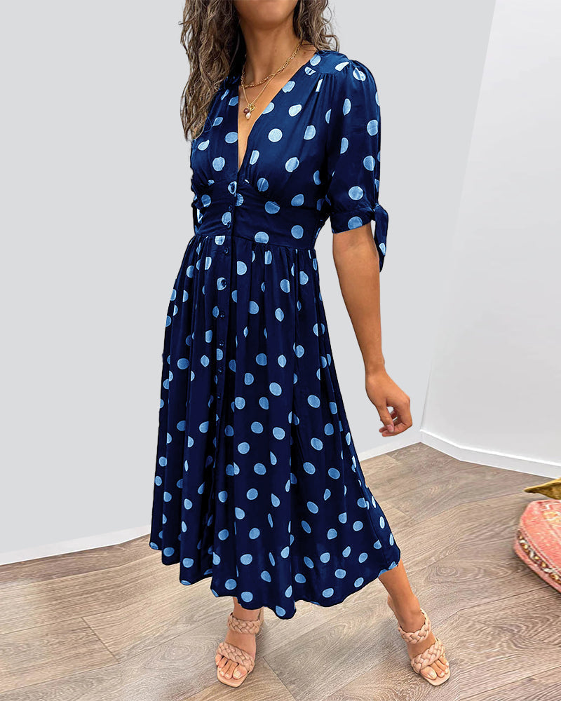Midi Dress with Polka Dots and a Deep V-Neck