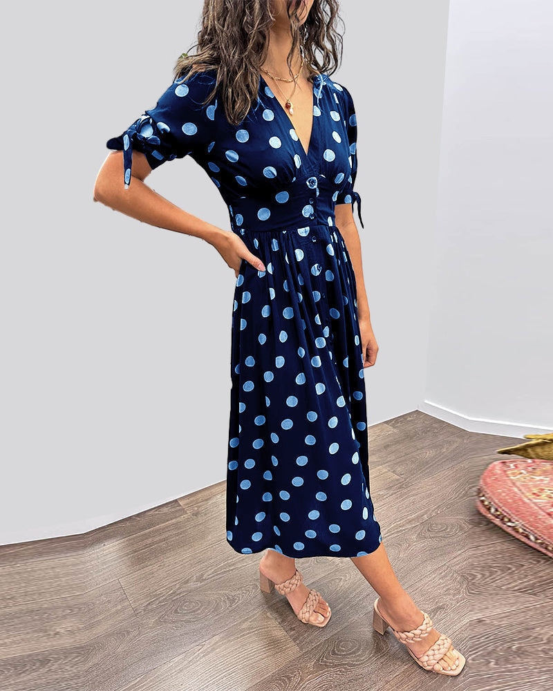 Midi Dress with Polka Dots and a Deep V-Neck